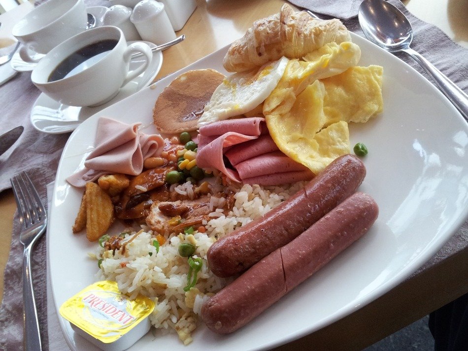 breakfast on a white plate in the restaurant