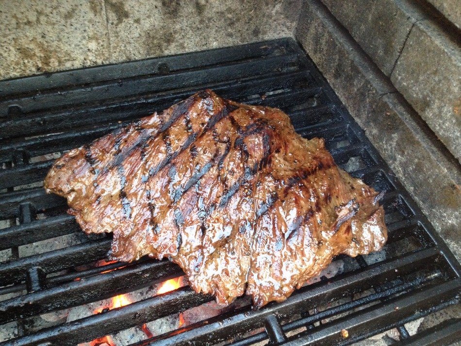 grilled steak in the fireplace