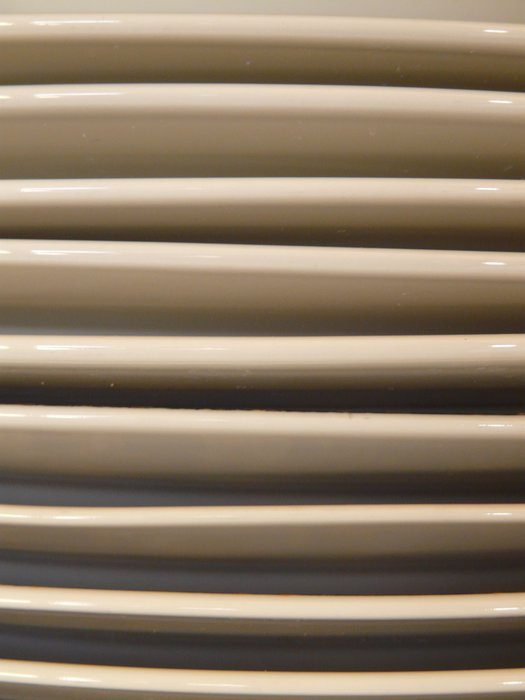 stack of white plates close-up