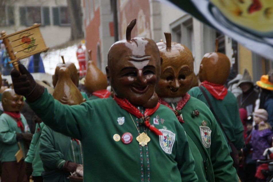 masks of applea and pears in carnival