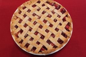 Lattice Cherry Pie at red background