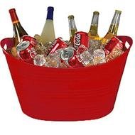 bottles with alcohol stand in ice in a red bowl