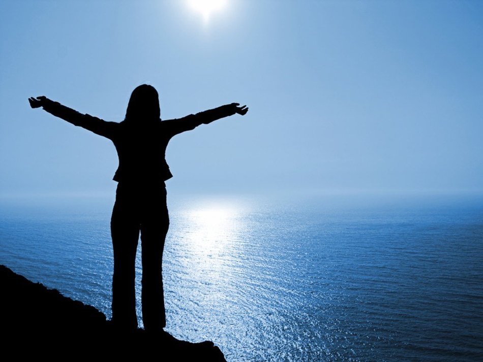 Silhouette of the person near the water