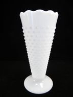 photo of a white triangular vase