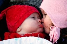 kissing siblings