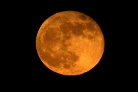orange Full Moon at black sky