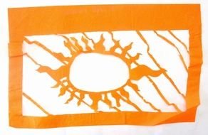 Orange and white drawing of the sun clipart