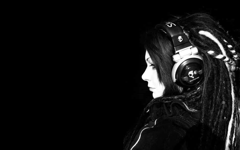 girl in headphones on a black background as a picture for a clipart