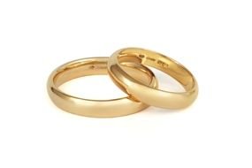 two gold Wedding Rings