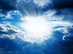 bright sunny glow in the blue sky