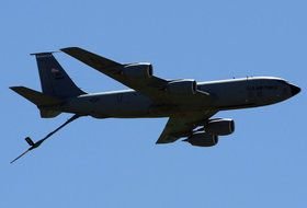 KS-135 aircraft flies in the clear sky