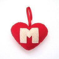 Letter M on a red heart as a picture for clipart