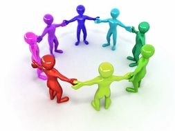 multi-colored little men stand in a circle and hold hands