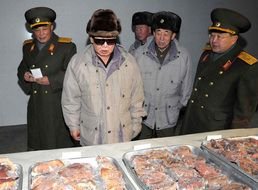 Kim Jong-un among the military as a picture for a clipart