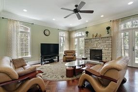 photo of a living room with leather furniture