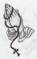 hands in prayer as a symbol for tattoo