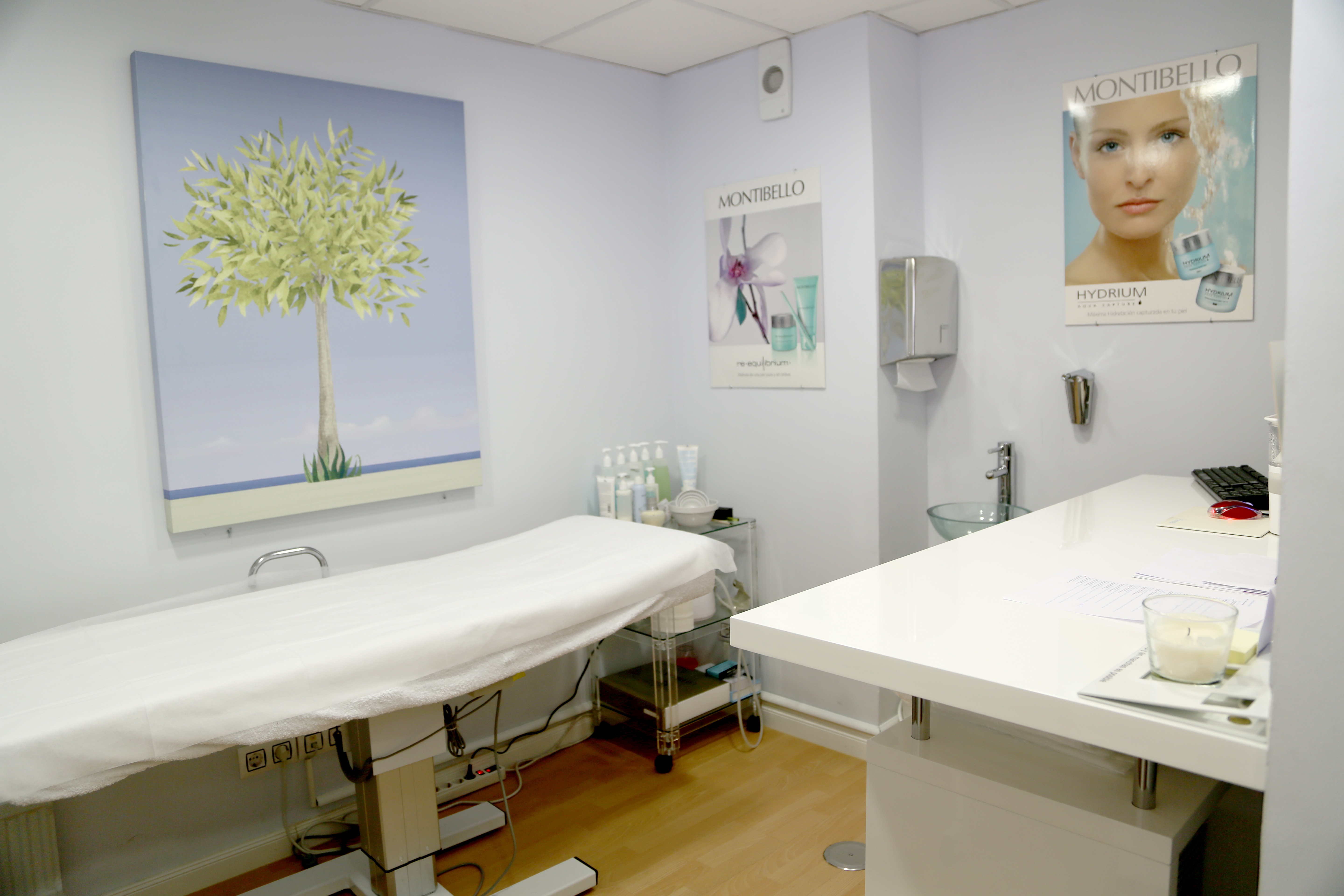 Medical treatment room with tree painting on wall free image download