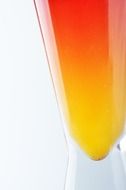 orange juice in a glass on a white background