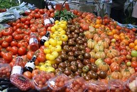 colorful tomatoes on market stall