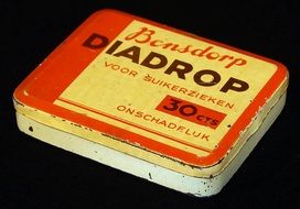 Vintage orange and white package of diadrop