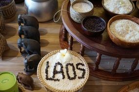 laos cereals in plates and elephant figures