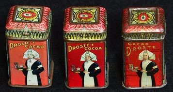 a set of tin cacao container boxes