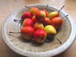 red yellow pears in a bowl