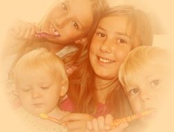 four children brushing their teeth together