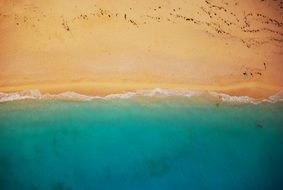 surfline, turquoise water and yellow sand