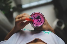 woman drinkong a yoghurt smoothie