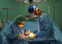 surgeon and his assistant during an operation