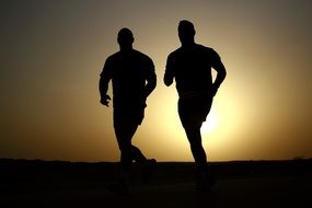 Photo of runner silhouettes