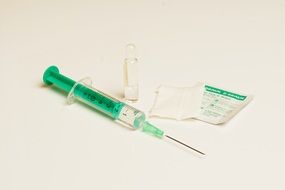 disposable syringe and the ampoule