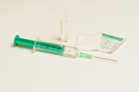 disposable syringe and ampoule