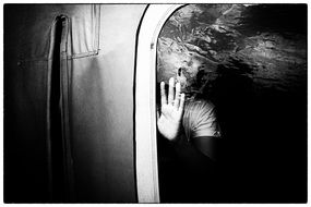 man with autism near the window