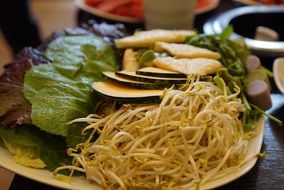 bean sprouts and pumpkin on the plate