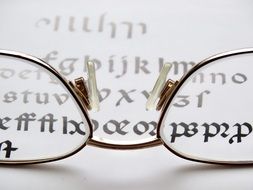 reading glasses and text