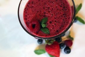 red smoothie with raspberries