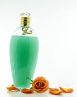 green liquid soap with rose petals
