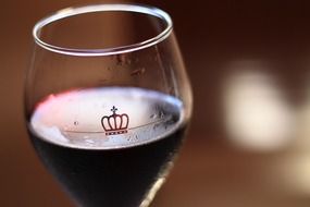 wine in glass, blurred background
