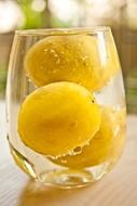 lemons in glass of water