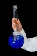 laboratory flask with blue liquid