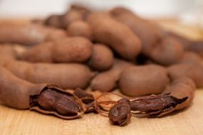 exotic tamarind on wooden surface