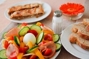 Breakfast with fresh vegetables, egg and toast