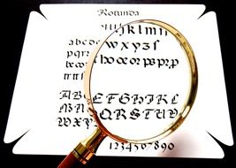 reading letters with a magnifying glass