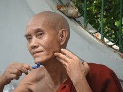 monk shaving
