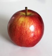 red apple on a light background