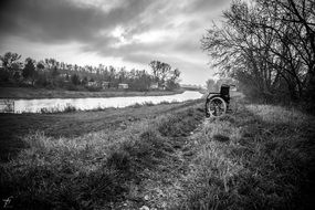 lonely wheelchair by the river