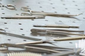 surgeon's tools on a metal tray