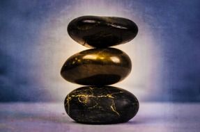 cairn made of black pebbles
